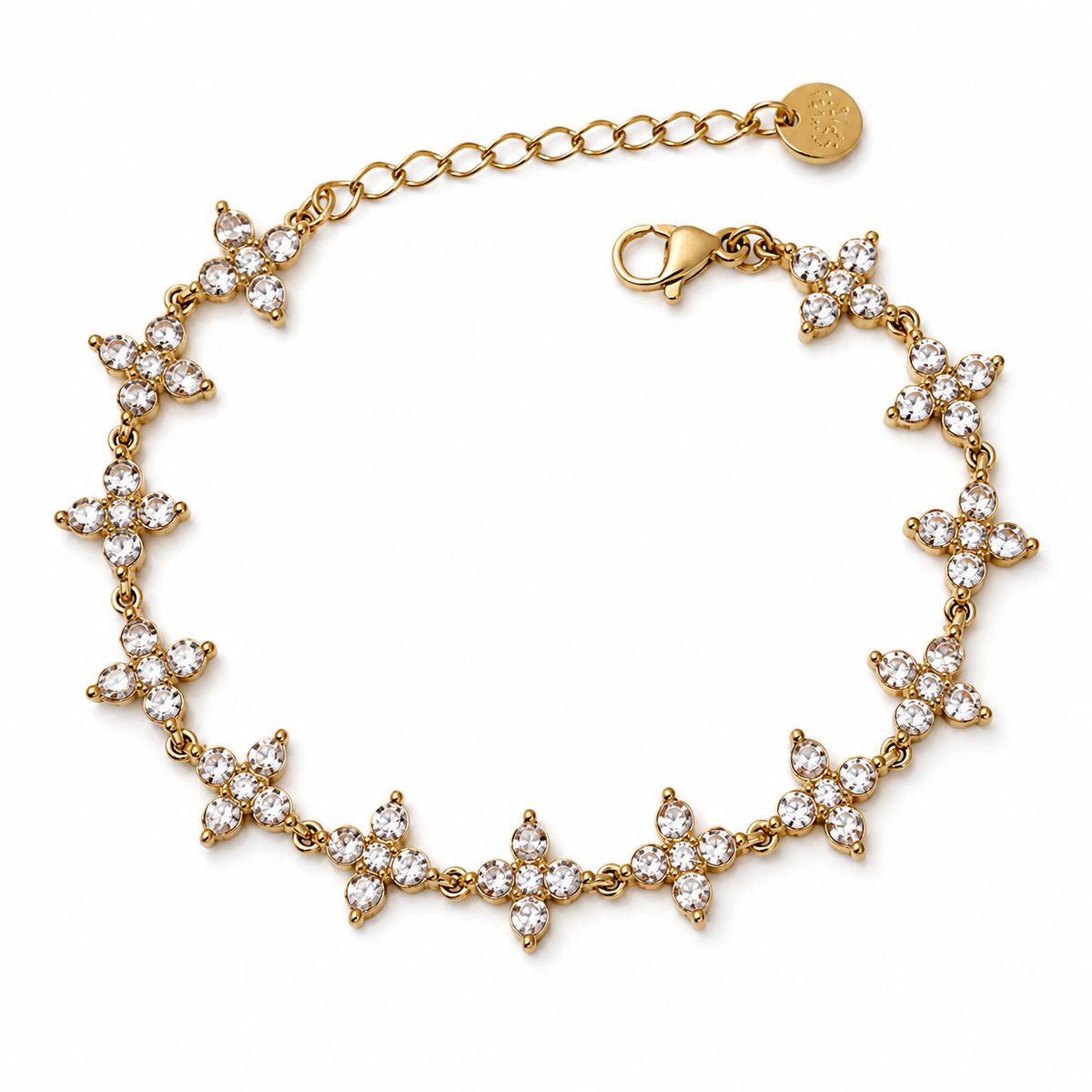 Bracelet Séfora doré avec motifs sertis de pierres sur fond blanc